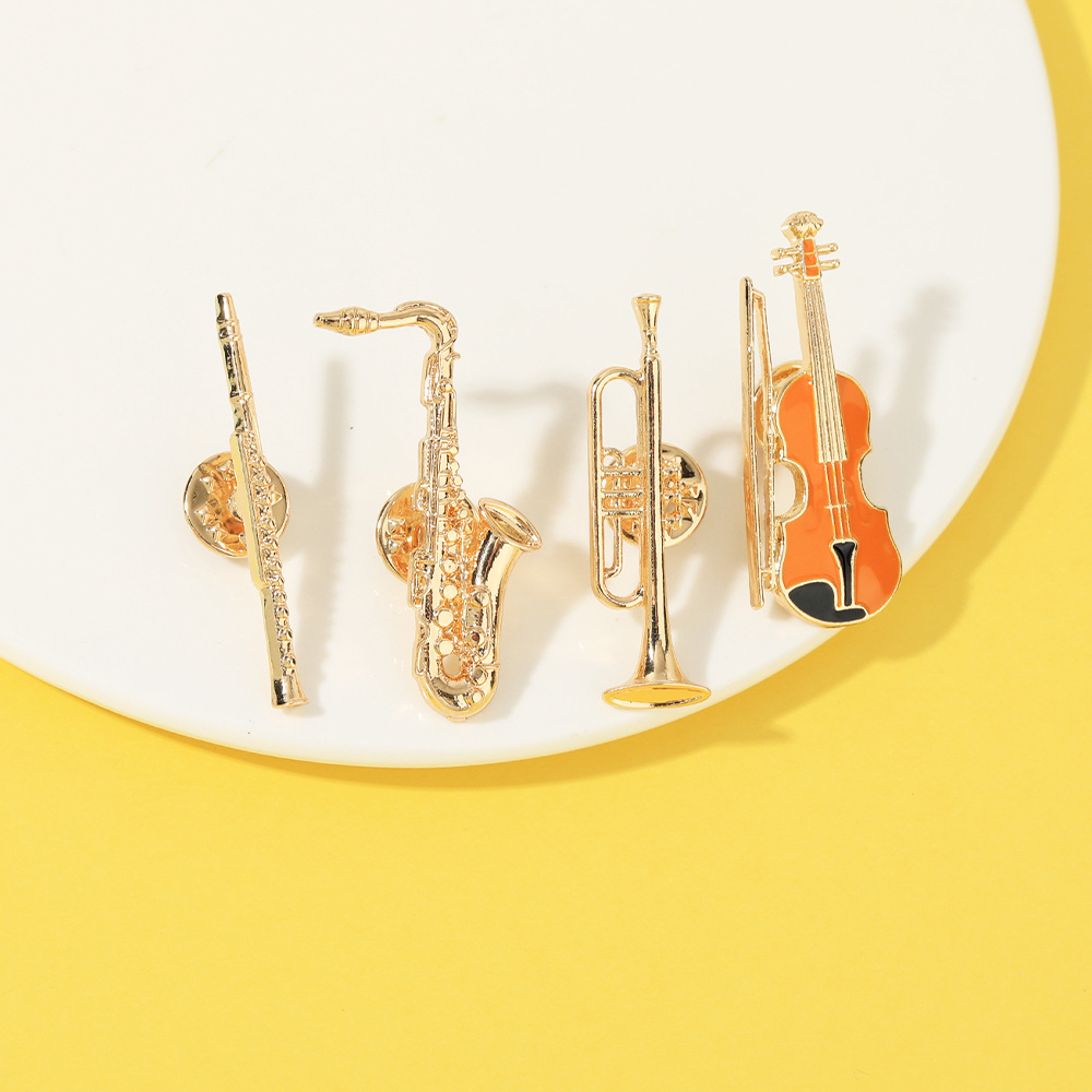 دبابيس وبروشات على شكل آلات مو - مراجعة Musical Instrument In Orchestra وسعره