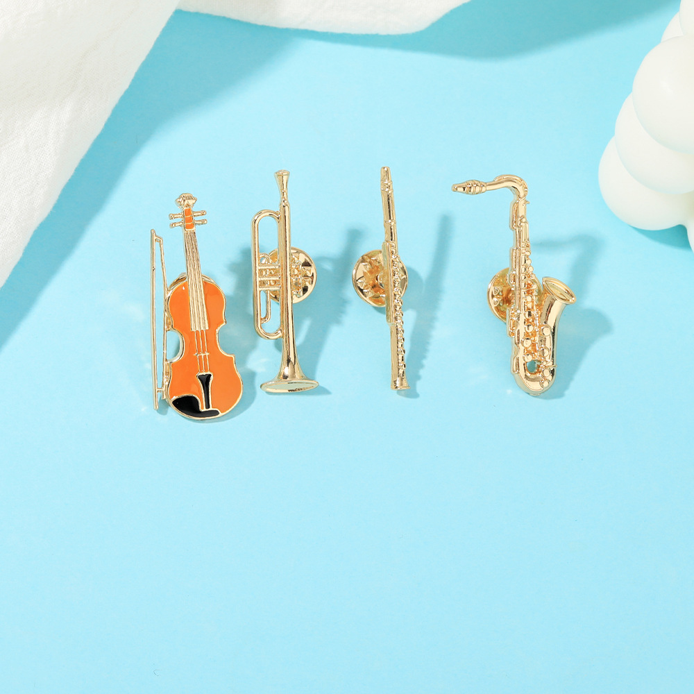 دبابيس وبروشات على شكل آلات مو - مراجعة Musical Instrument In Orchestra وسعره